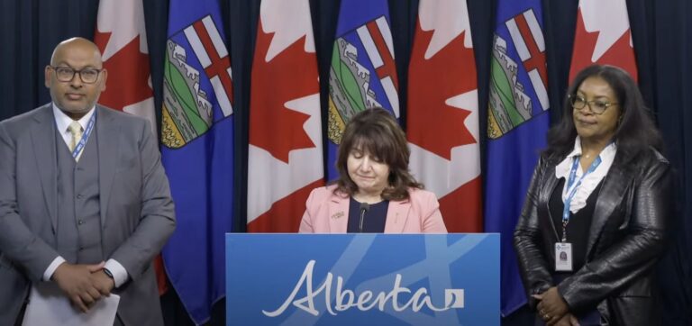 Interim Chief Medical Officer of Health Dr. Sunil Sookram, Minister of Health Adriana LaGrange and CEO, Primary Care Alberta Kim Simmonds at the May 5th Measles update (Photo Your Alberta livestream)